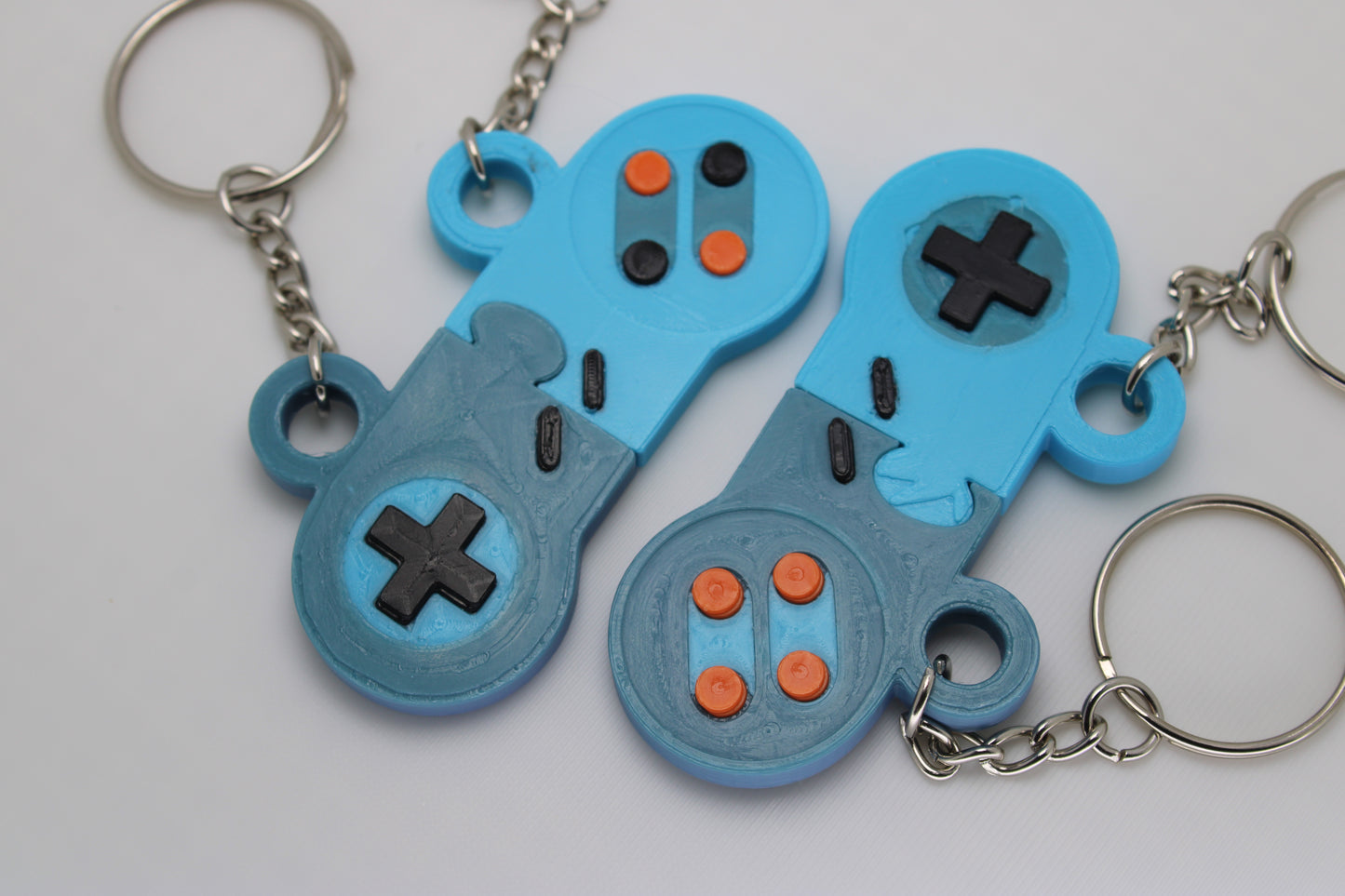 Retro Gamer's Dream: SNES Controller Matching Keychain Set