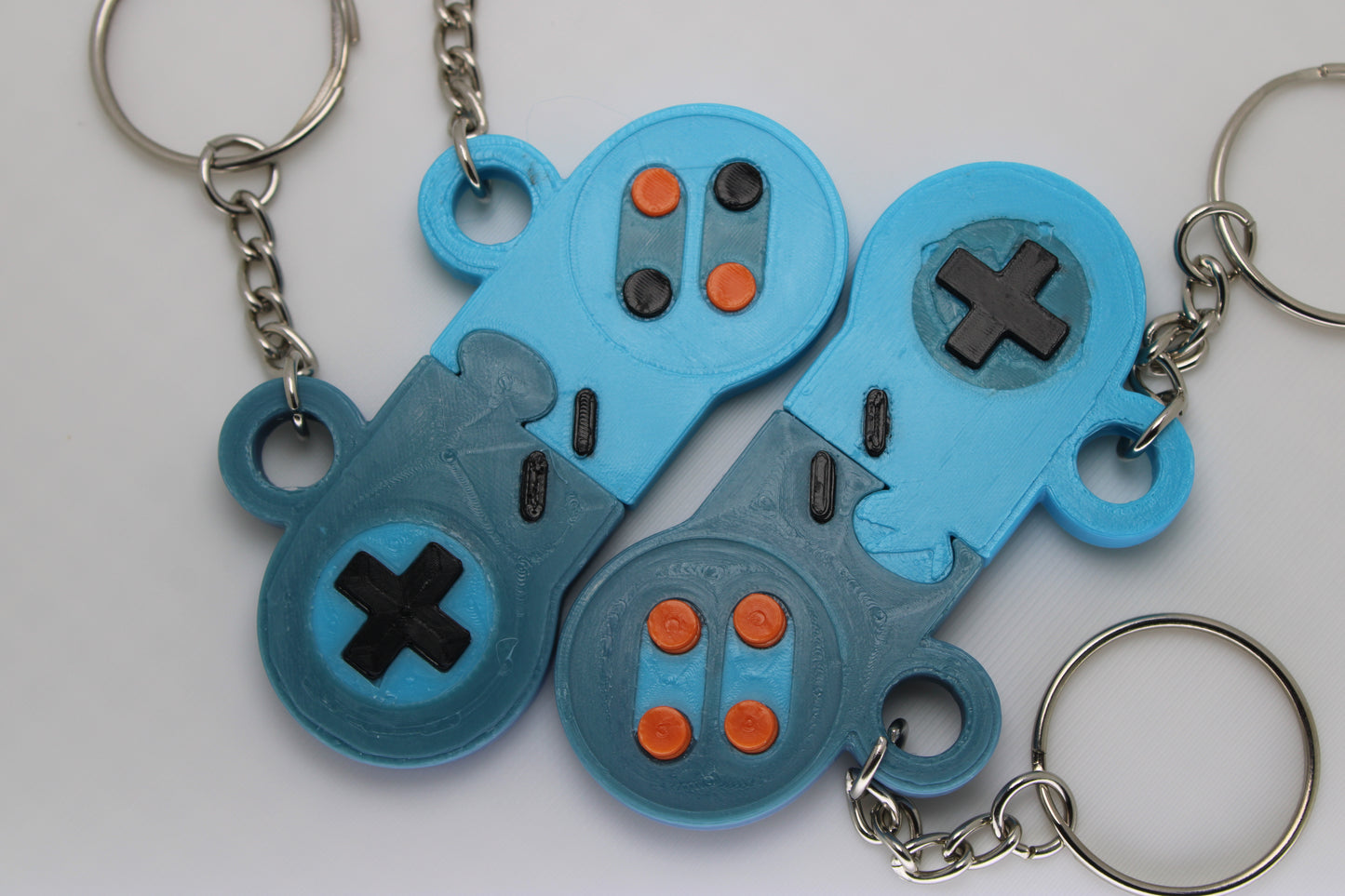 Retro Gamer's Dream: SNES Controller Matching Keychain Set